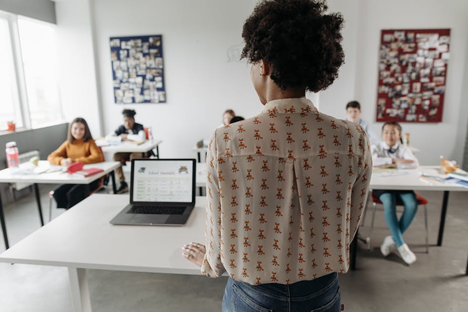 Female teacher engaging students in a classroom setting with diverse learners